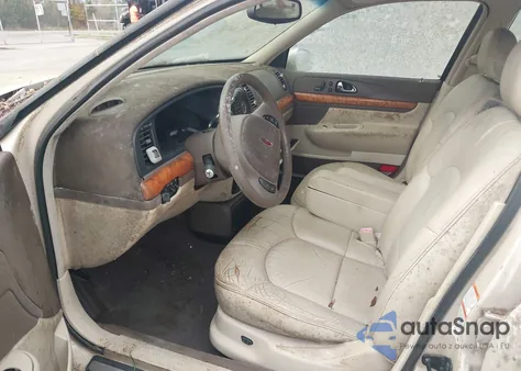 1999 Lincoln Continental z USA, uszkodzony, nr VIN 1LNHM97V1XY697540